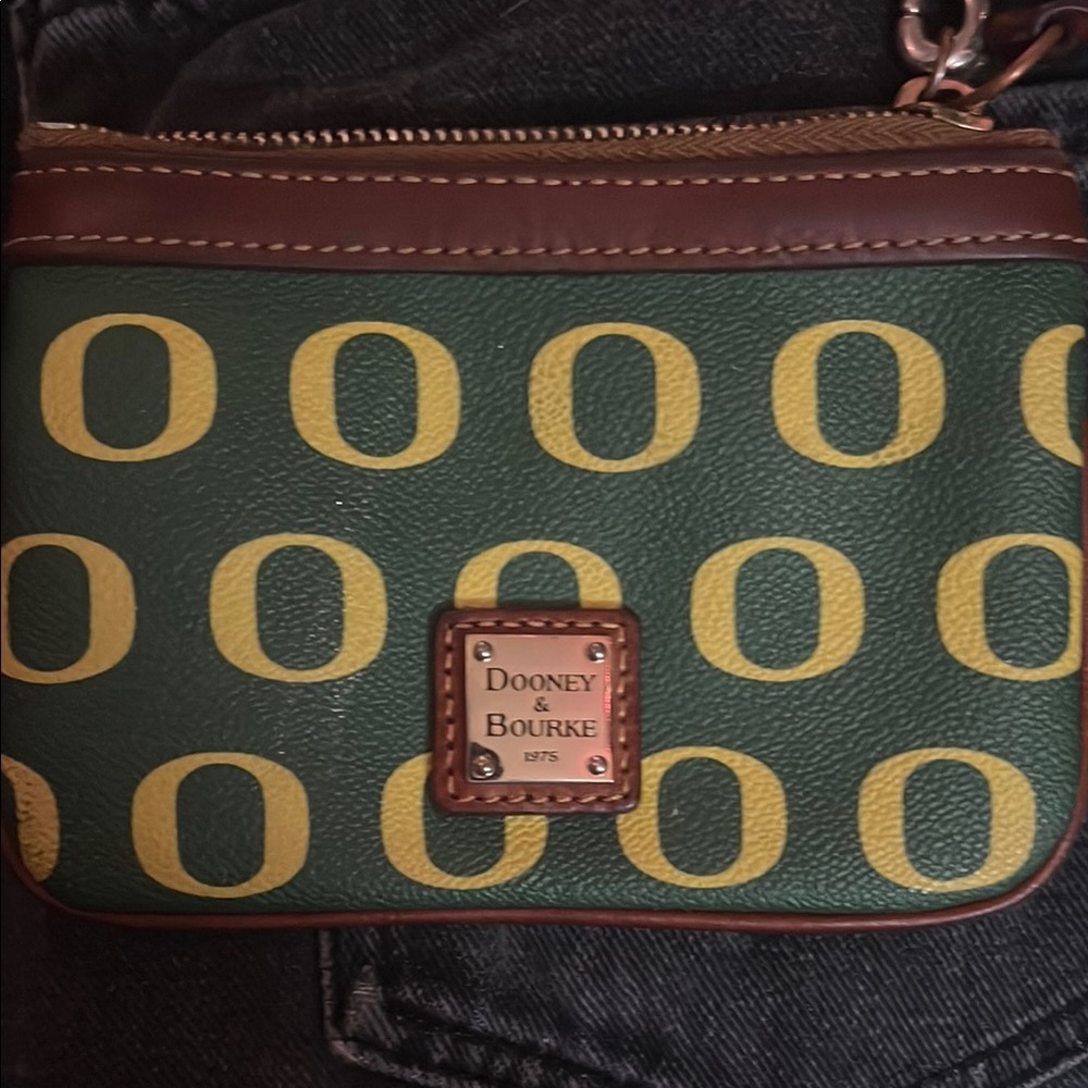 Oregon Ducks Dooney & Bourke wristlet.